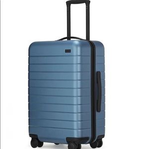 ISO: Away Travel Large bag (checked size) in Jewel Blue